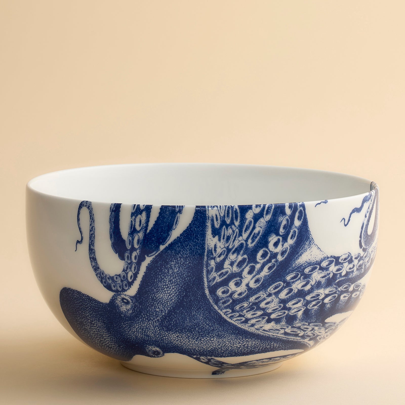 Our biggest and most impressive Lucy the Octopus Bowl is fit for a feast as she wraps herself around and into this large serving bowl in high-fired porcelain from Caskata