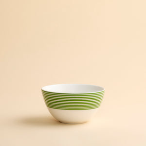 Newport Verde Cereal Bowl in porcelain with bright green concentric lines around the top half of this perfectly sized bowl from Caskata.