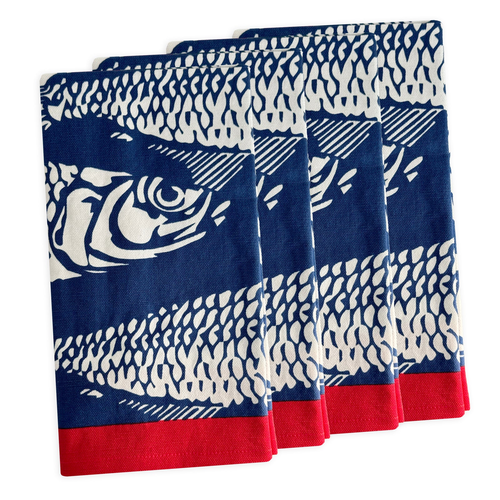 The Sardines Dinner Napkins by Caskata, set of 4, feature a playful blue and white sardine design with red borders—perfect for adding charm to your table setting.