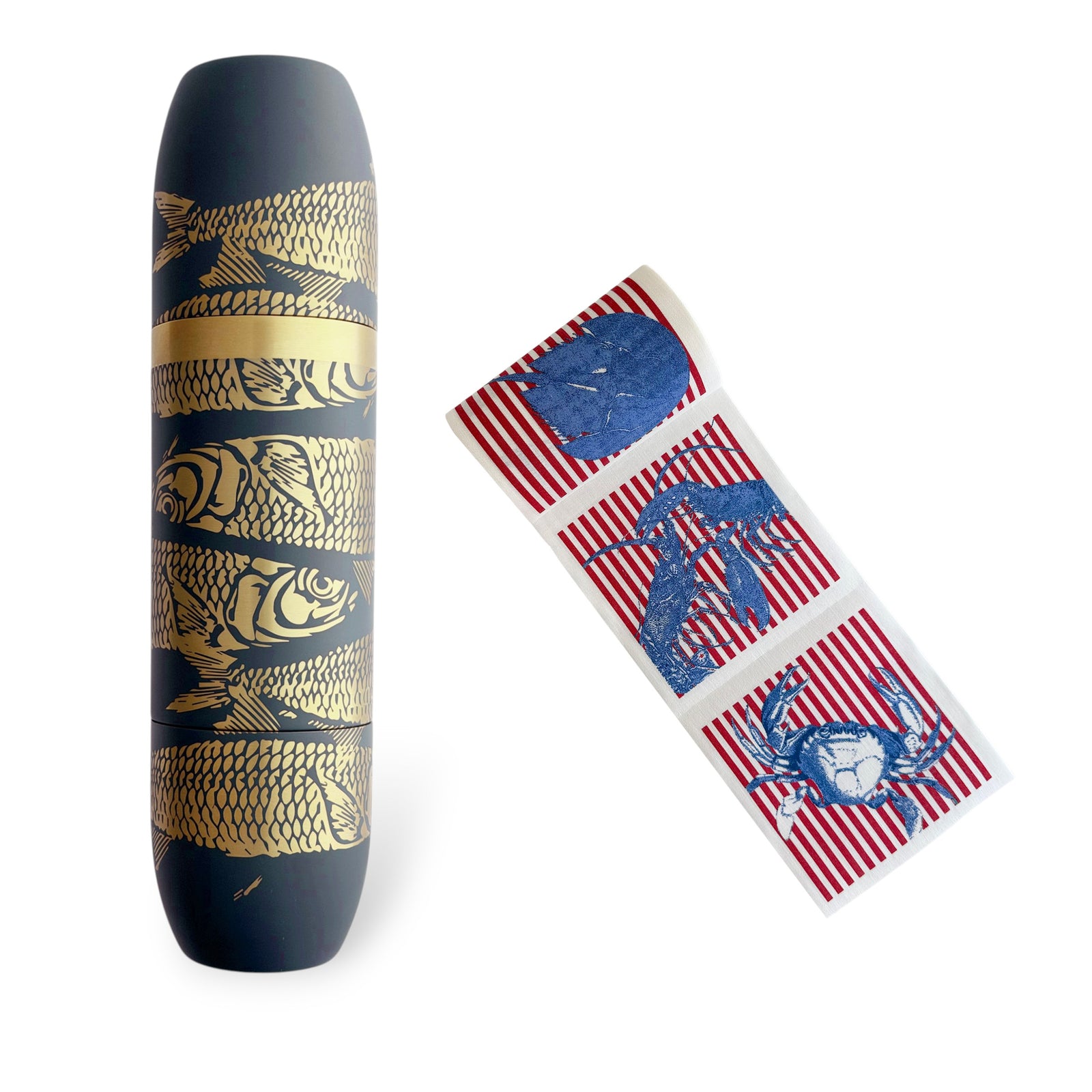 The Sardines Flask Beach Bundle by Caskata includes a black cocktail napkin roll with gold fish illustrations and red-and-white striped stickers featuring blue sea animals—ideal for on-the-go entertaining.