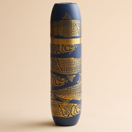 Caskata x High Camp Dark Blue Sardines Wine Flask in dark blue, featuring a gold sardine pattern and a gold center band.