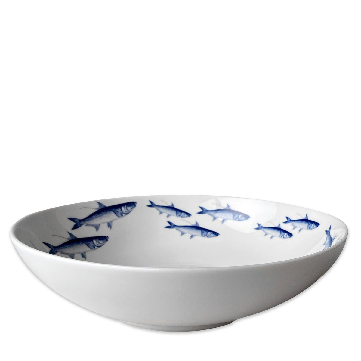 A Caskata Artisanal Home School of Fish Wide Serving Bowl.