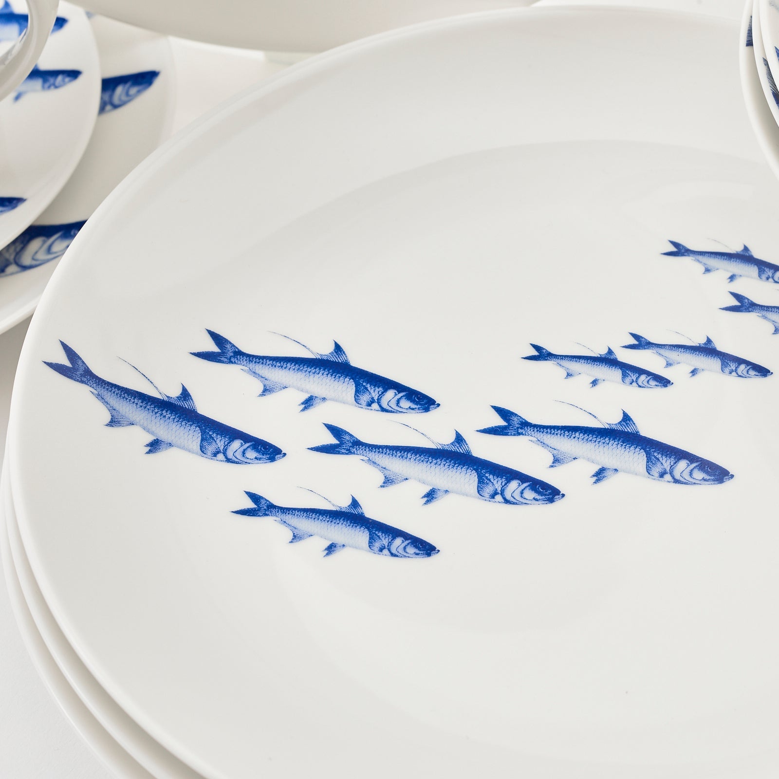 School of Fish 16 piece dinnerware set in blue and white porcelain from Caskata