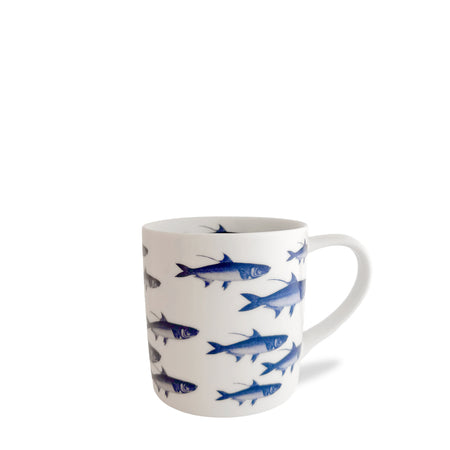 School of Fish Mug in Blue from Caskata in high-fired porcelain this mug holds 14 oz. and is decorated with our signature school of fish.
