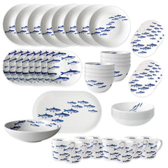 The Caskata School of Fish Ultimate Set is a full porcelain dinnerware collection with blue fish designs, including plates, bowls, mugs, and serving platters.
