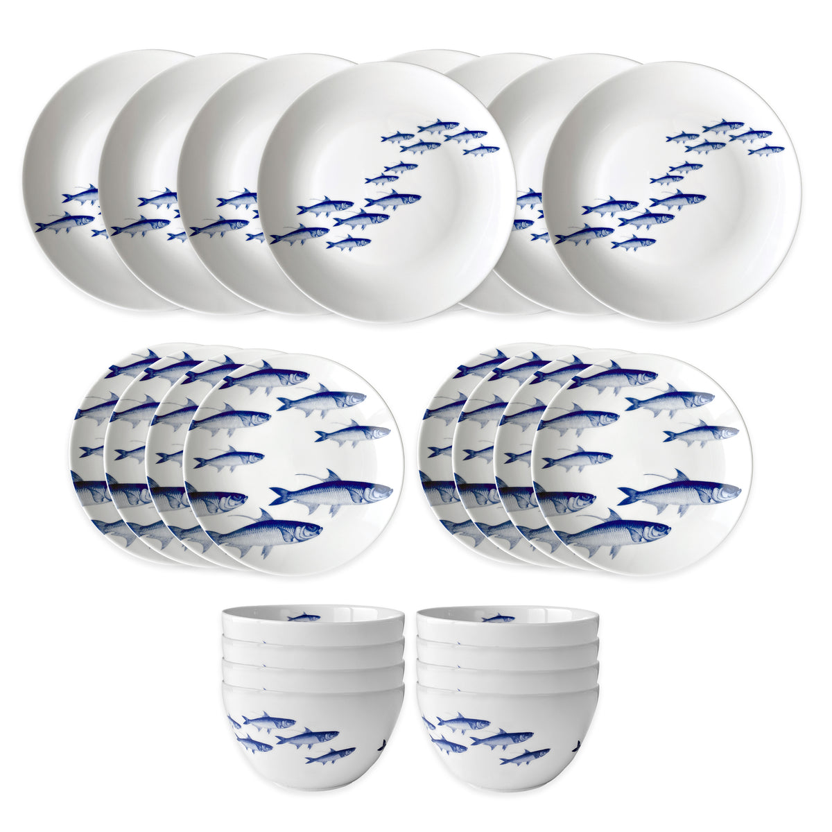The Caskata School of Fish Table for 8 is a 24-piece porcelain dinnerware set featuring white plates and bowls with blue fish designs. Dishwasher and microwave safe, it’s shown neatly arranged on a white background.