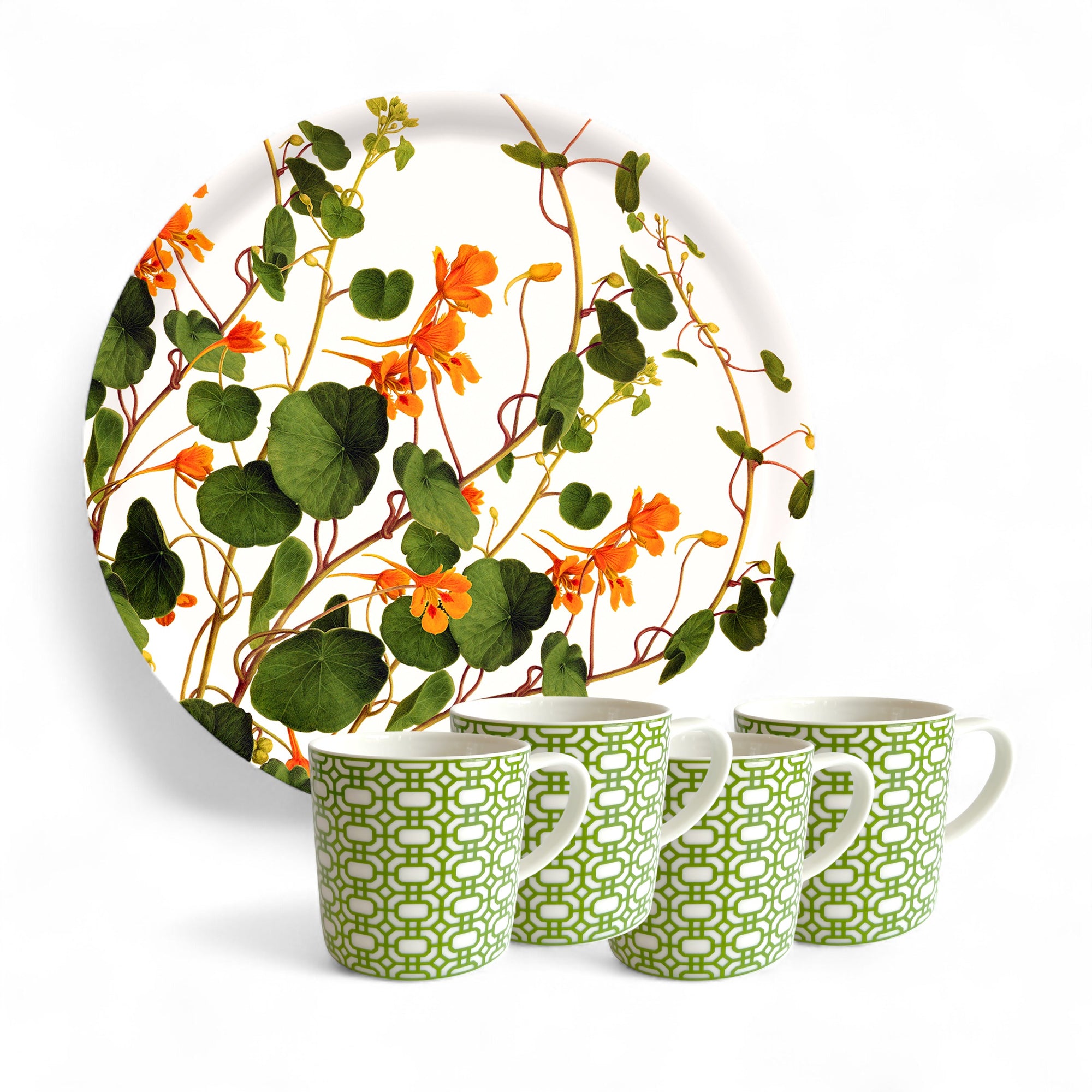 The Caskata "Serving Spring" Bundle features a round plate with an orange flower and green leaf pattern behind four porcelain mugs with green-and-white designs—a charming gift for gardeners.