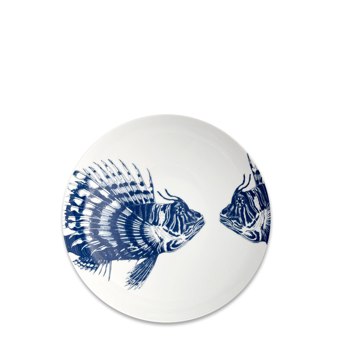 The Caskata Spiky Fish Entrée Bowl features two blue fish illustrations facing each other—a charming ceramic piece that brings coastal vibes to your table.