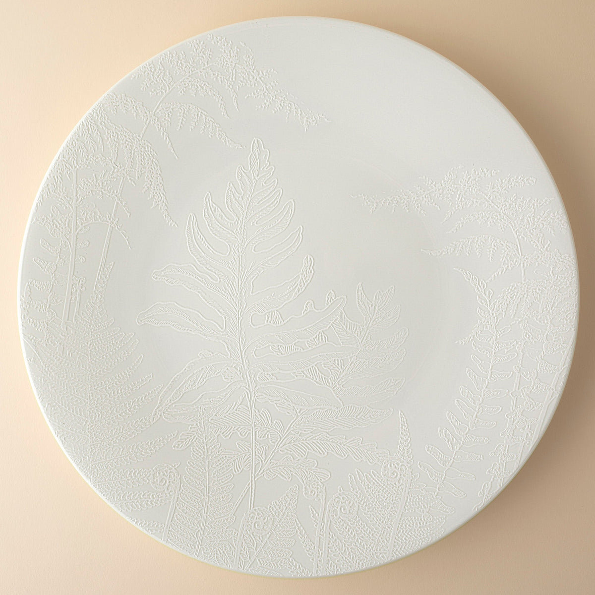 Spring White on White Porcelain Coupe Platter from Caskata features ferns and Flowers in raised glazes 