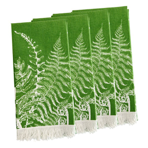 Caskata’s Spring Verde Dinner Napkins feature a set of four green cotton napkins with white fern leaf patterns and fringed ends, ideal for fresh spring table decor.