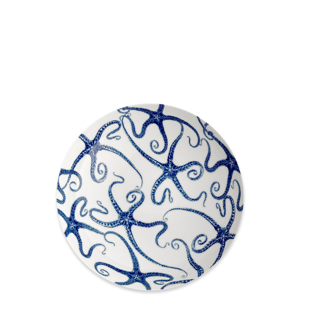 The Caskata Starfish Entrée Bowl features an intricate blue starfish pattern on a round white design, perfect for bringing coastal style to your table.