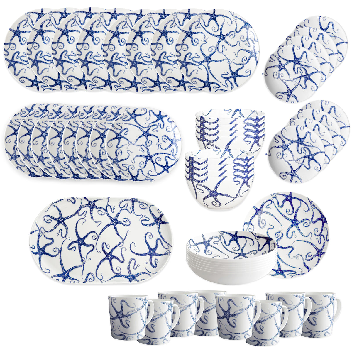 The Caskata Starfish Ultimate Set features white ceramic plates, bowls, mugs, and serving trays with coastal blue starfish designs, all arranged in rows on a white background.