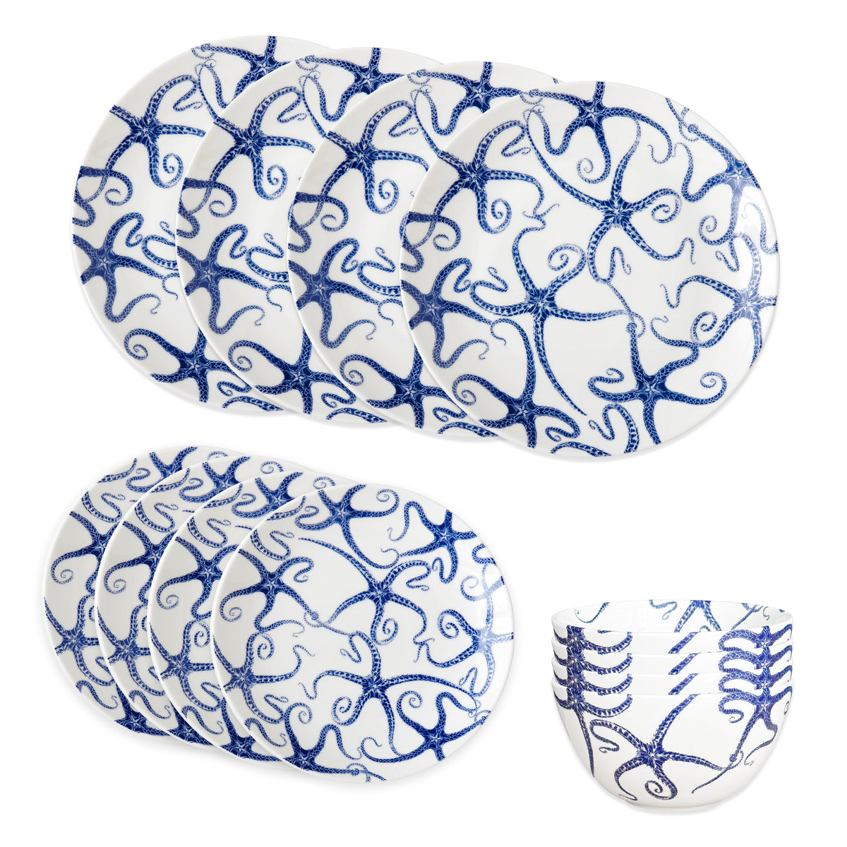 The Caskata Starfish Table for 4 set includes six white plates and six bowls with blue octopus tentacle patterns—perfect coastal dishes to bring a touch of the ocean to your table.