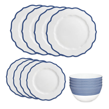 The Caskata Stella Blue Table for 4 set includes six large plates, six small plates, and one bowl, all in white with blue rim designs. Dishwasher and microwave safe, this porcelain set brings elegance to any table.