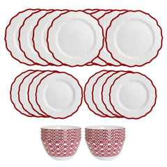 The Stella Red Table for 8 by Caskata offers twelve white plates with red scalloped edges and two bowls with red geometric patterns—an ideal porcelain dinnerware set to create a festive holiday look for special gatherings.