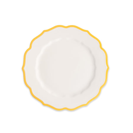 The Caskata Stella Scalloped Marigold Salad Plate is an elegant white porcelain plate with a scalloped edge and yellow border, shown on a plain white background.