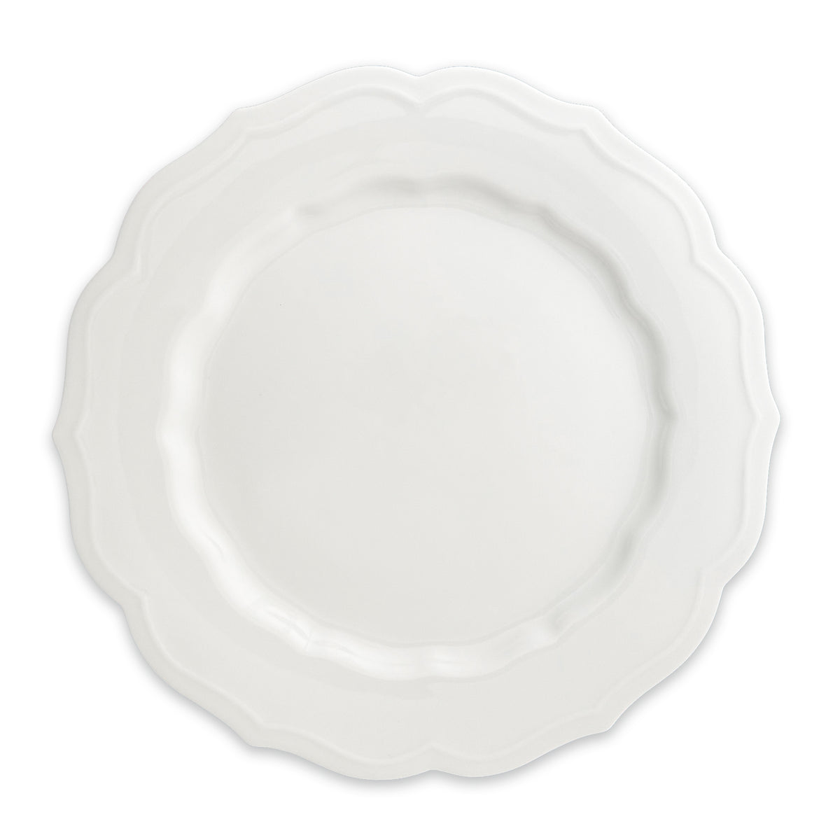 The Stella Scalloped White Dinner Plate by Caskata is a round porcelain dish featuring a scalloped edge, offering a vintage vibe that seamlessly complements any neutral palette or dinnerware design.