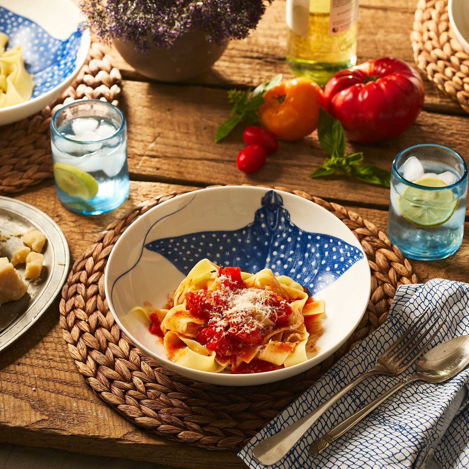 Caskata's "Ray" the Stingray Entrée Bowl features a white ceramic design with a blue spotted stingray illustration inside—an ideal coastal accent for your table.