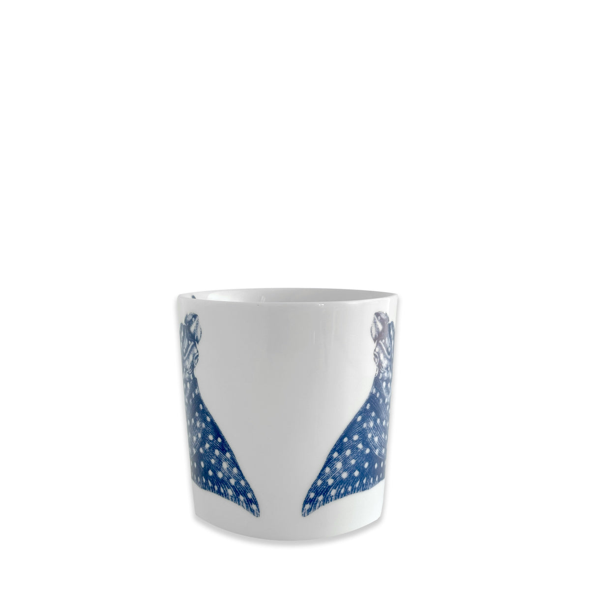 Caskata&#39;s &quot;Ray&quot; the Stingray Mug is a white porcelain mug with a blue spotted ray illustration on both sides, displayed against a plain white background.