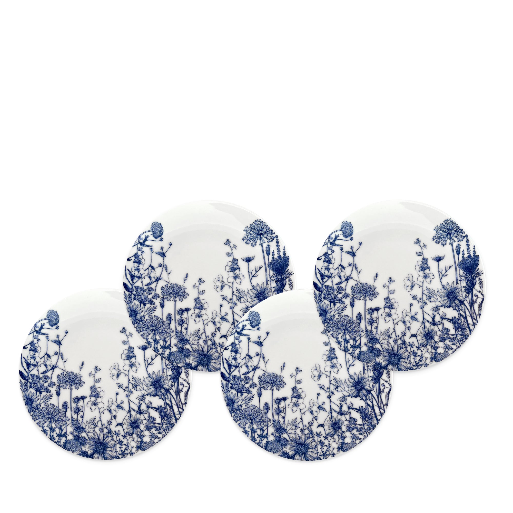 Five Summer Blues Small Plates by Caskata, crafted from high-fired porcelain with blue floral designs, are arranged in a semi-circular pattern.