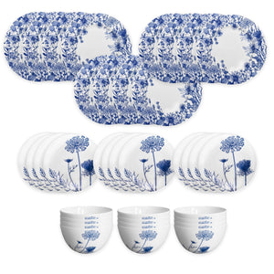 The Caskata Summer Blues Table for 12 is a 36-piece porcelain set with blue floral designs on white, including plates, bowls, and serving platters—perfect for elegant dining.