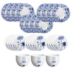 The Caskata Summer Blues Table for 12 is a 36-piece porcelain set with blue floral designs on white, including plates, bowls, and serving platters—perfect for elegant dining.