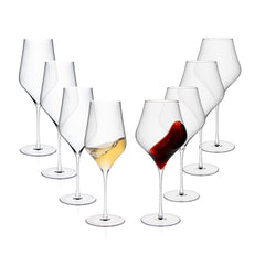 Eight empty wine glasses are arranged in a V-shape; Caskata’s The Terrace Wine Lover’s Starter Set features lead-free crystal glasses, with one holding white and another red wine—ideal for any gathering.