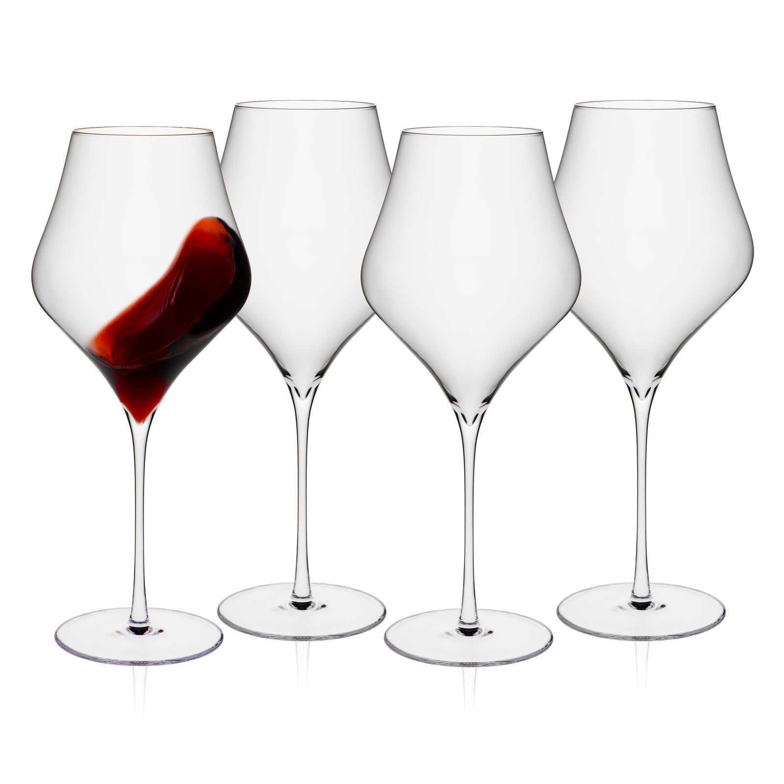 Four Caskata Terrace Red Wine Glasses stand in a row on a white background; the leftmost glass swirls red wine, while the other three remain empty.