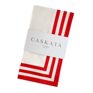 Caskata’s Triple Stripe Red Dinner Napkins, set of 4, feature folded white cotton with a red geometric border. Each 22