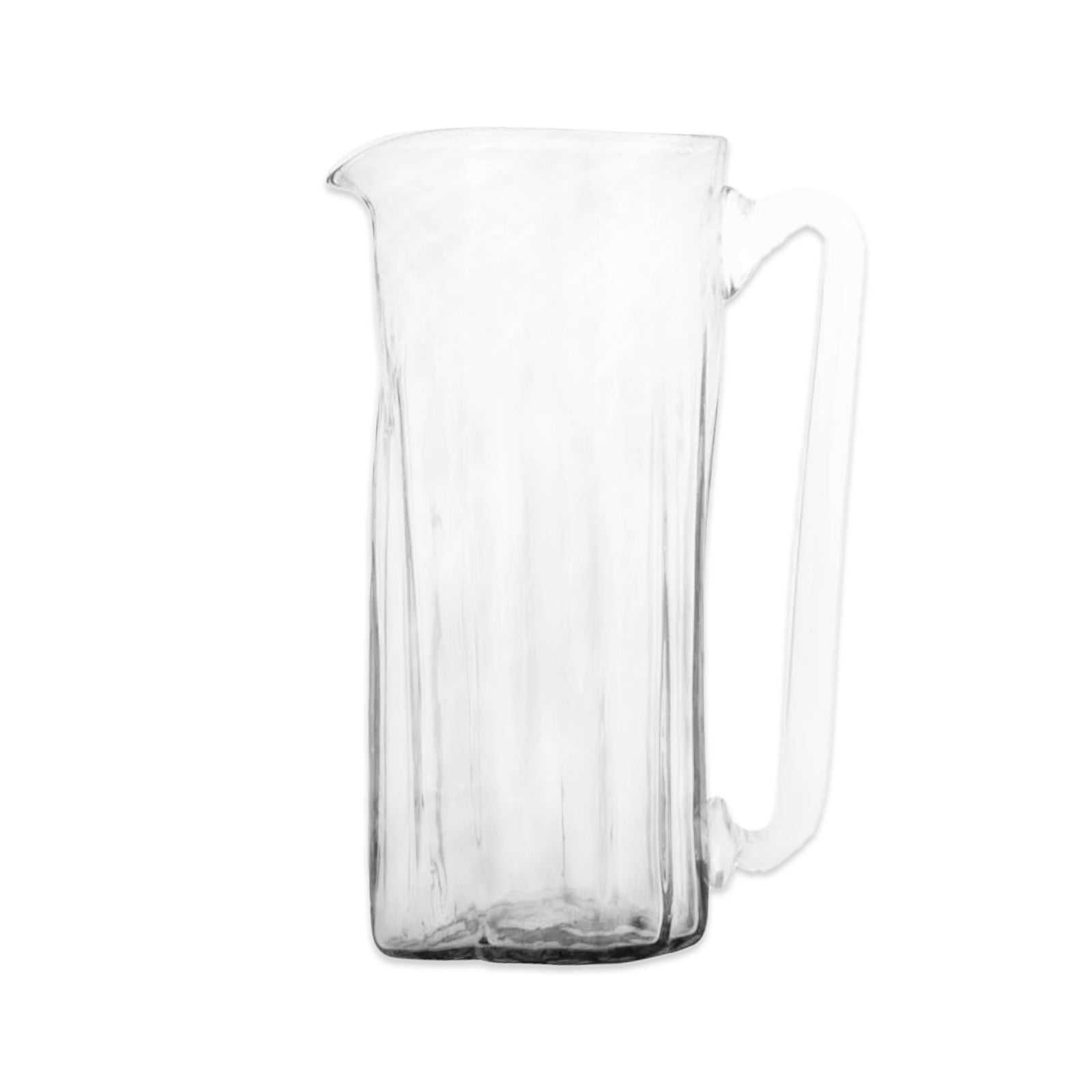 The Viento Large Clear Pitcher by Caskata features artisan handblown clear glass with a square base, vertical ridges, handle, and spout, shown on a white background.
