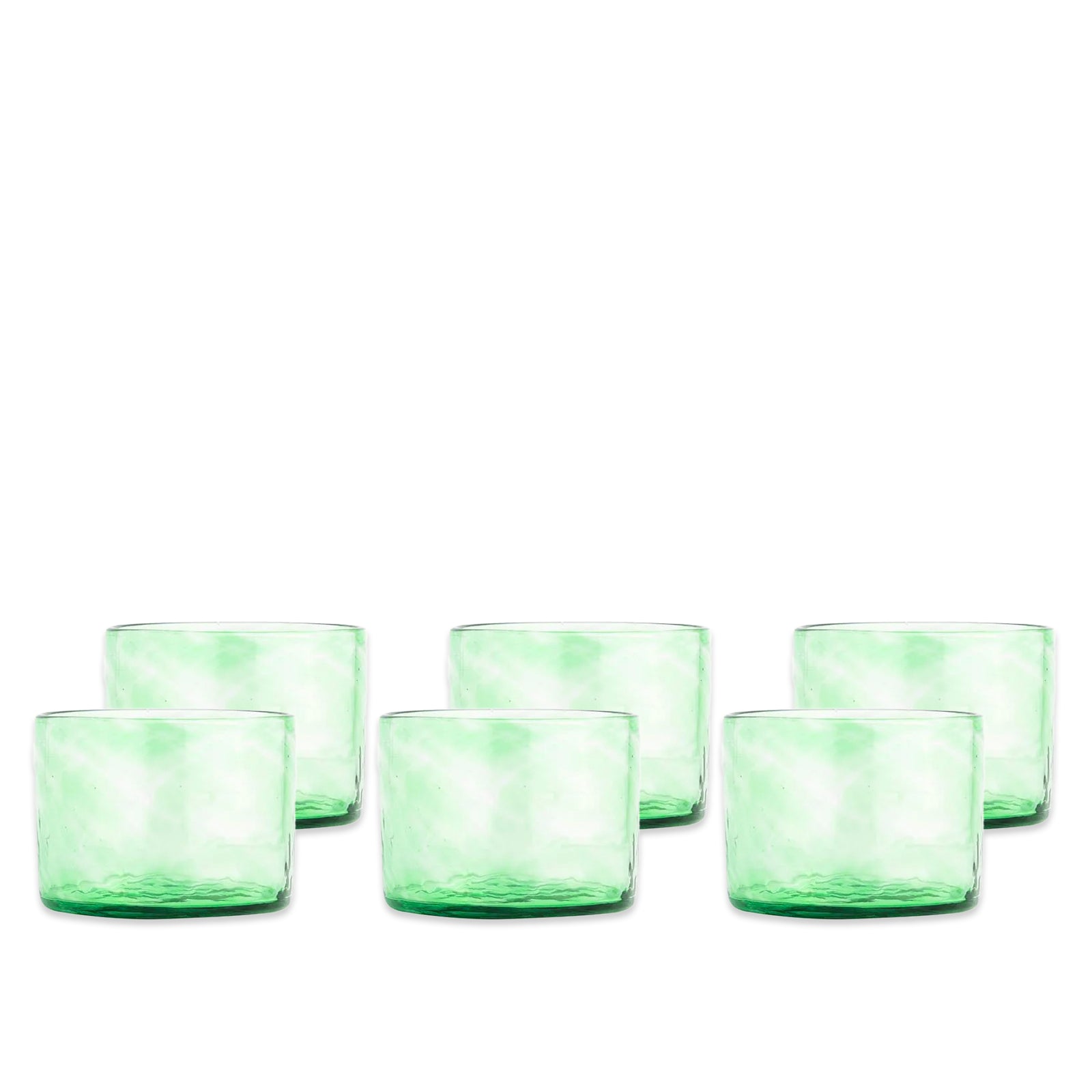 Six Caskata Viento Small Green Tumblers, Set of 6, are arranged in two rows against a white background.