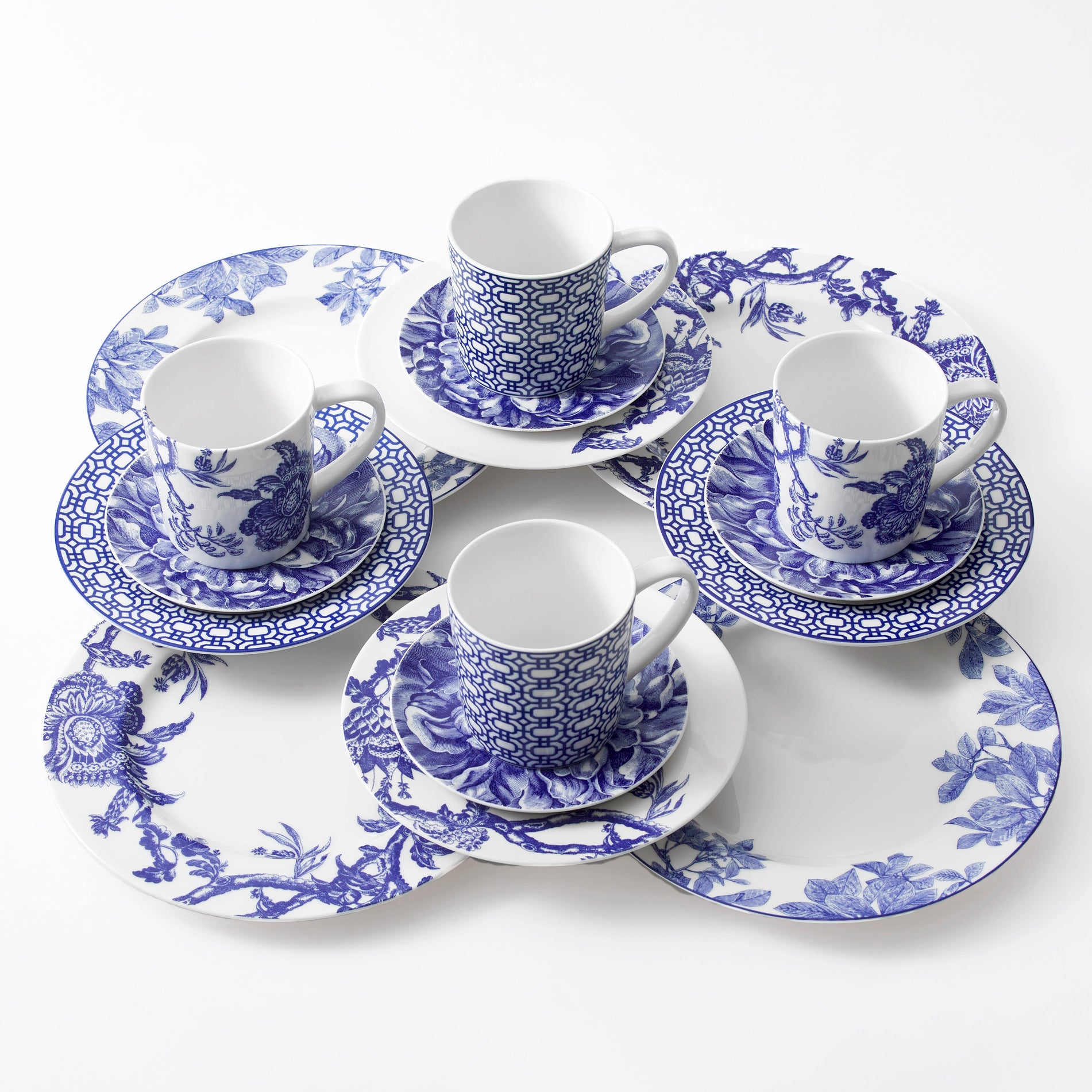 Romantic mixed botanical 16 piece dinnerware set in blue and white porcelain from Caskata.