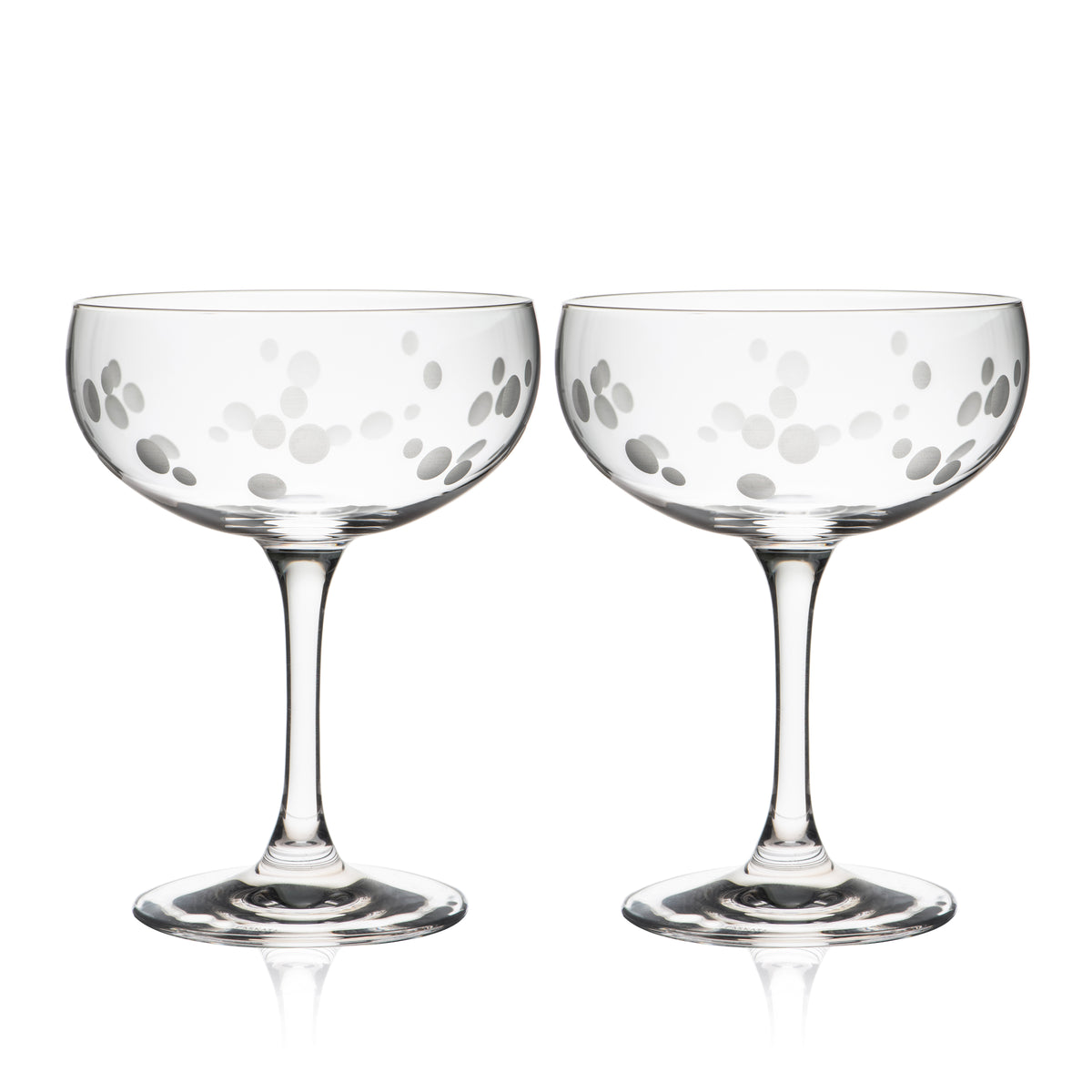 A Chatham Pop etched coupe cocktail glasses by Caskata with glass marbles.