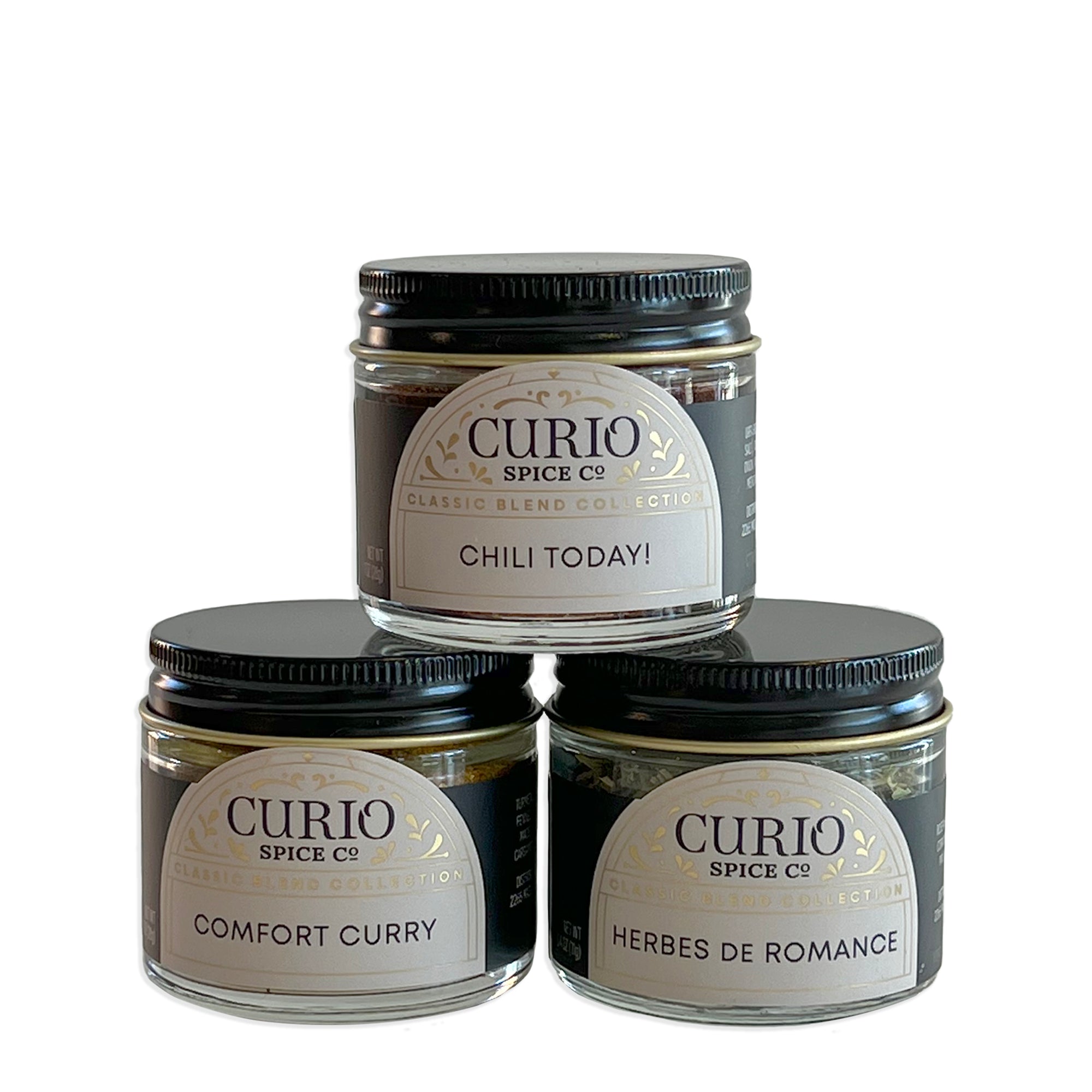 Classic Spice Blend 3-Jar Set from Curio Spice features Chili Today!, Comfort Curry, and Herbes De Romance in a gift boxed set from Caskata