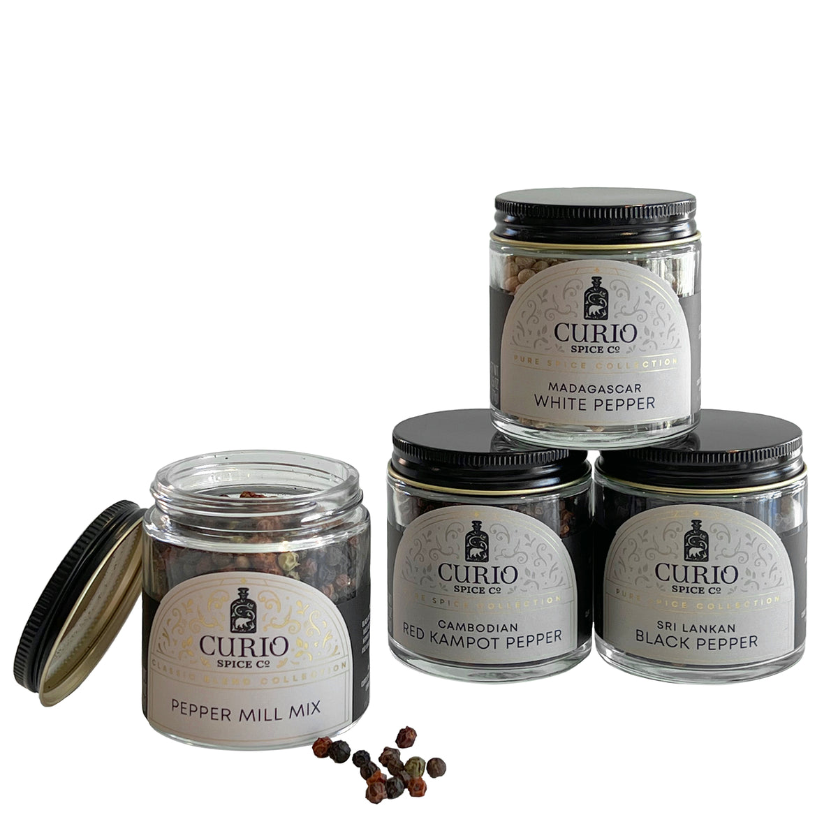 A curated Collection of Four Peppercorn Varieties from Curio Spice Co. for Caskata