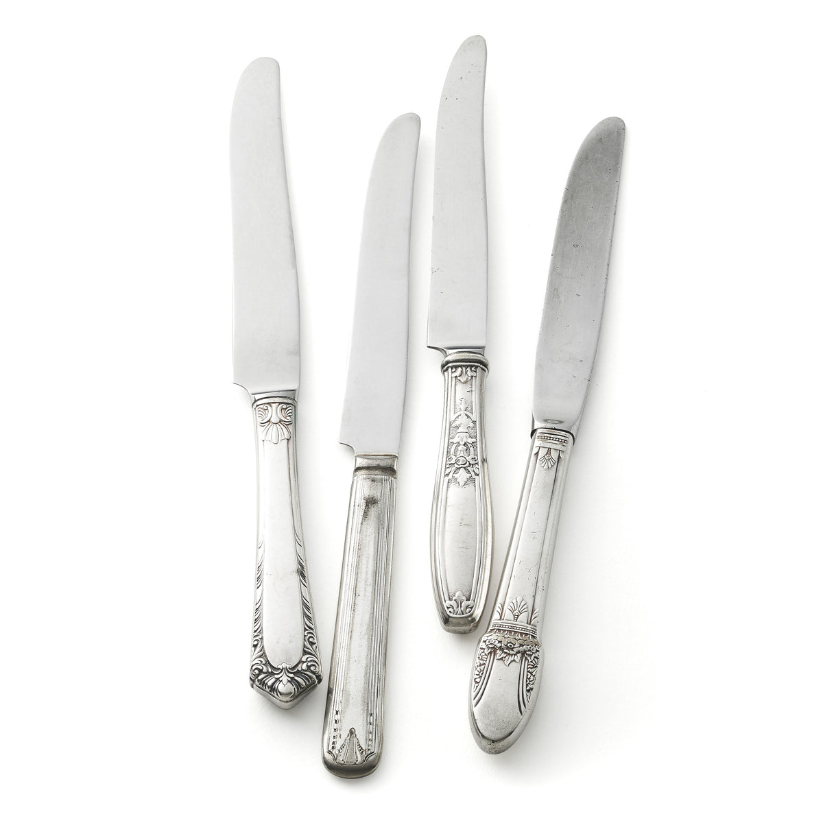 Vintage, silver-plated dinner knives, collected by Caskata.