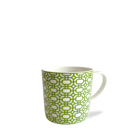 A Newport Garden Gate Verde Mug featuring a white ceramic body adorned with a green chainlink pattern by Caskata Artisanal Home.