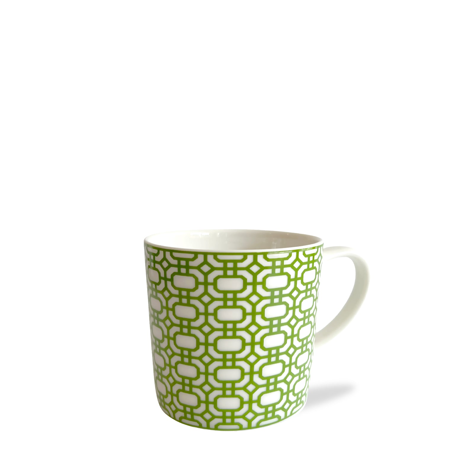 A Newport Garden Gate Verde Mug featuring a white ceramic body adorned with a green chainlink pattern by Caskata Artisanal Home.