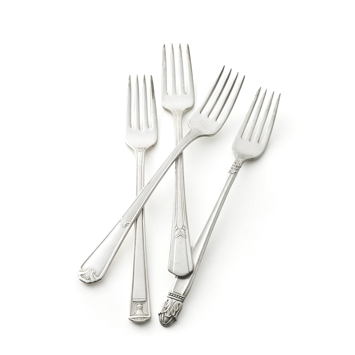 Vintage, silver-plated grille forks collected and restored by Caskata.