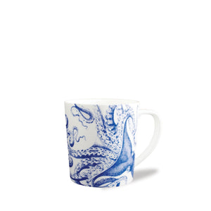 The Lucy Mug by Caskata Artisanal Home features a vivid blue octopus wrapping around white porcelain, perfect for adding coastal charm to your drinkware collection. Shown against a plain white background.