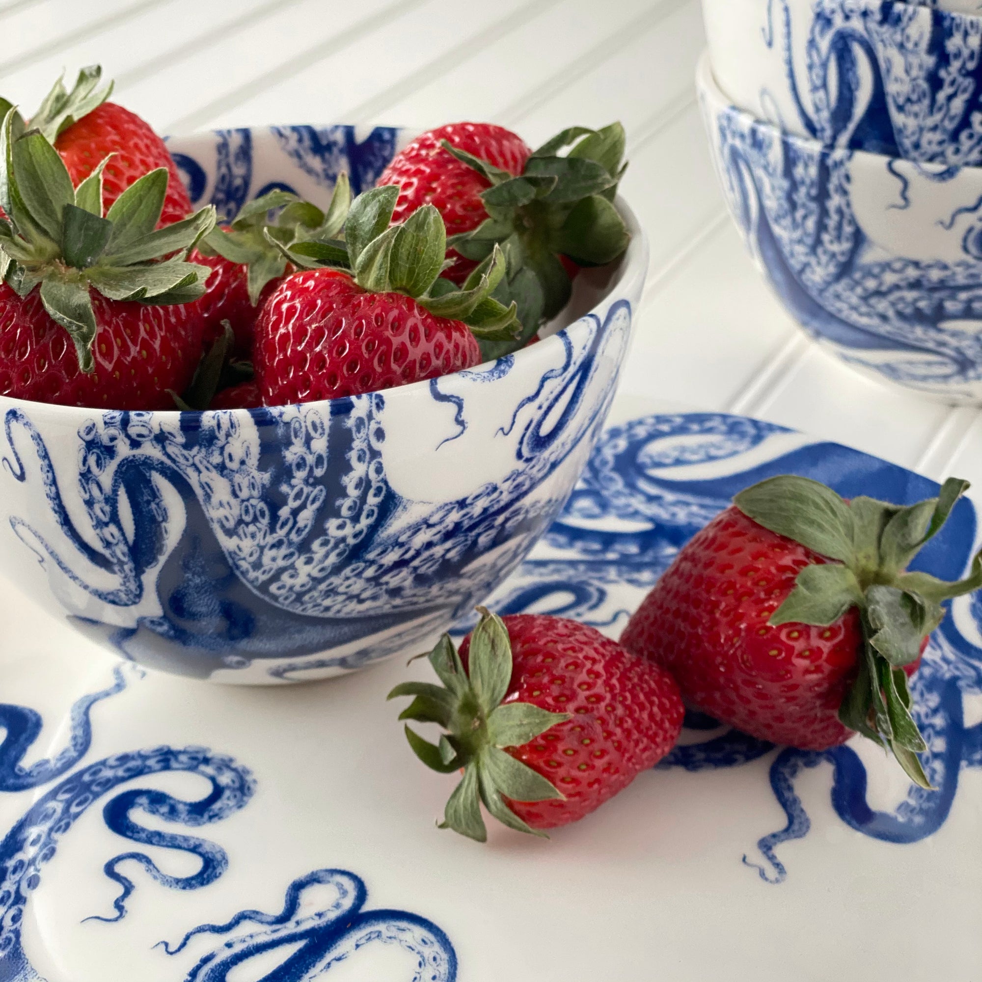 A creamy white Lucy Snack Bowl by Caskata Artisanal Home on a white background.