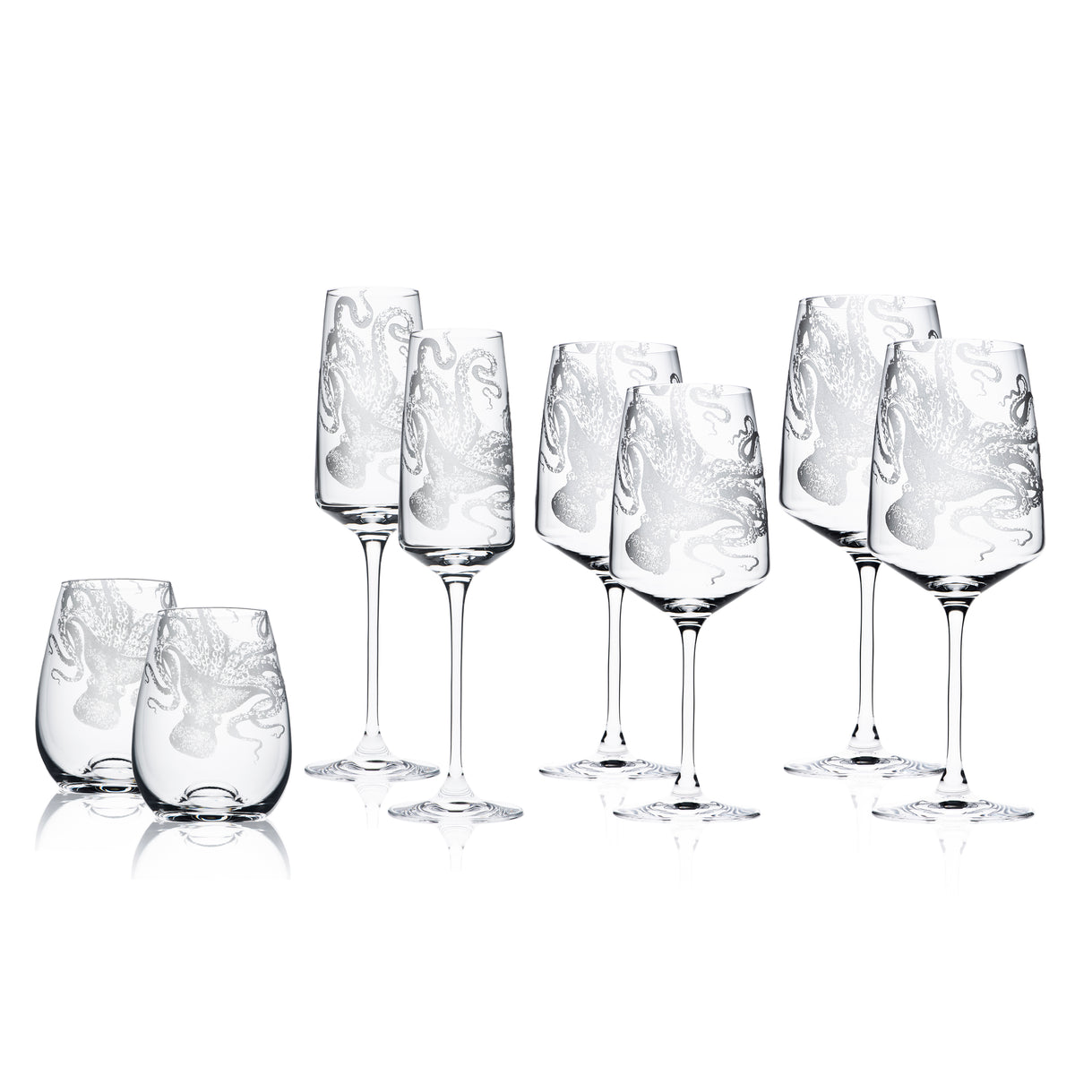 Lucy the Octopus is sand-etched into this hand decorated lead-free crystal wine glass collection from caskata, featuring 2 stemless wine glasses, 2 champagne flutes, 2 white wine and 2 red wine glasses.