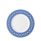 A Newport Garden Gate Rimmed Salad Plate with a blue geometric pattern around the rim, crafted from premium porcelain by Caskata Artisanal Home, perfect for adding a touch of elegance to any table setting.