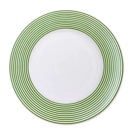 A **Newport Stripe Verde Rimmed Dinner Plate** featuring the Newport Stripe design with closely spaced green concentric circles around the rim, crafted from high-fired porcelain by **Caskata Artisanal Home**.