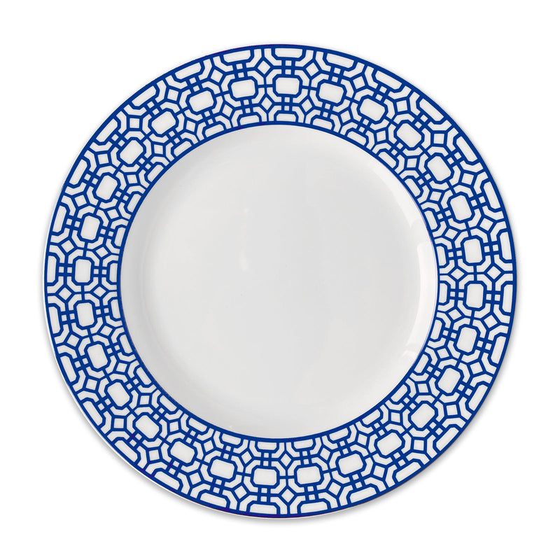 A Newport Garden Gate Rimmed Dinner Plate by Caskata Artisanal Home featuring a geometric blue pattern along the rim, perfect for any contemporary dinnerware or coastal collections.