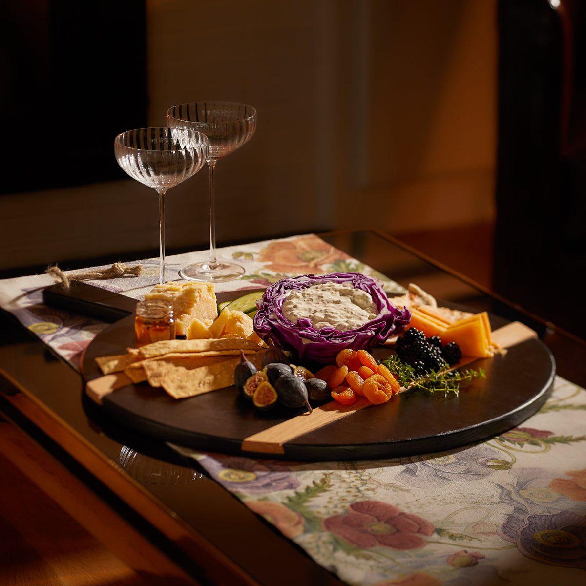 Black and Natural Charcuterie Round Board from Caskata.