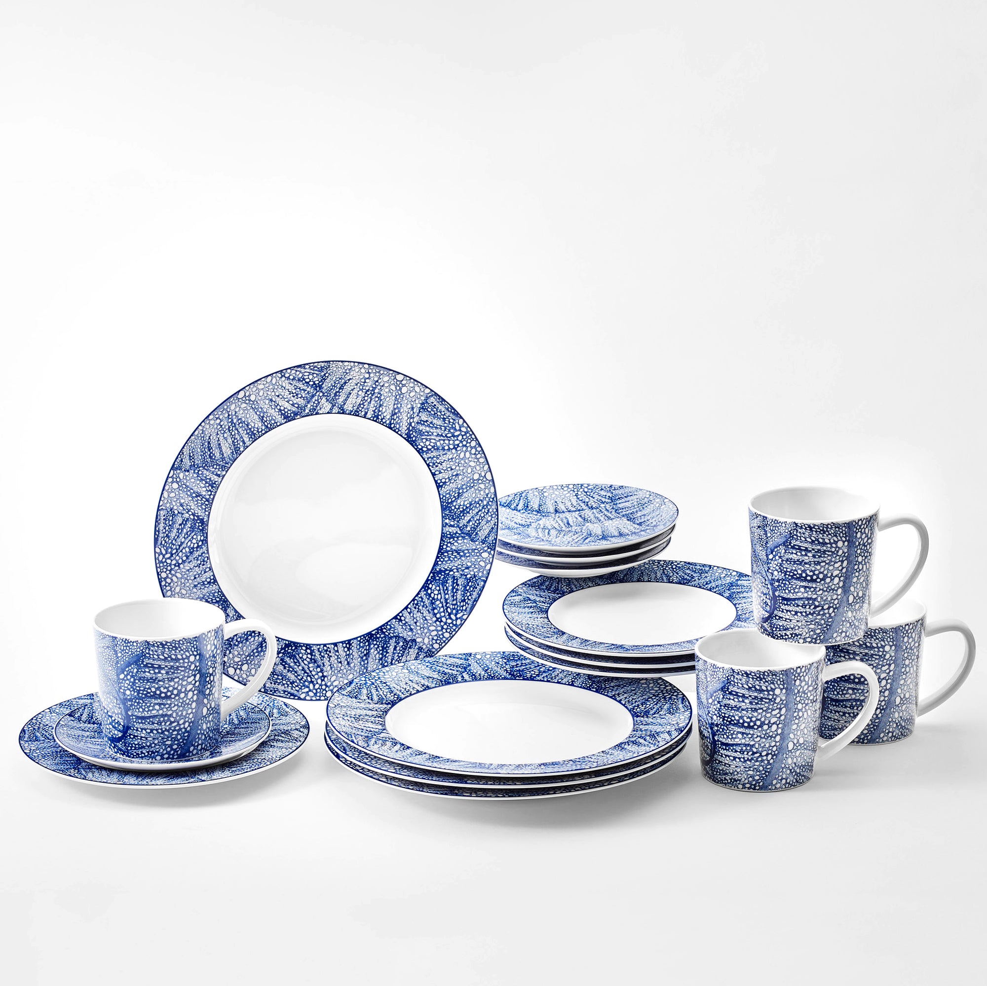 SeaFan 16 piece dinnerware set in blue and white porcelain from Caskata