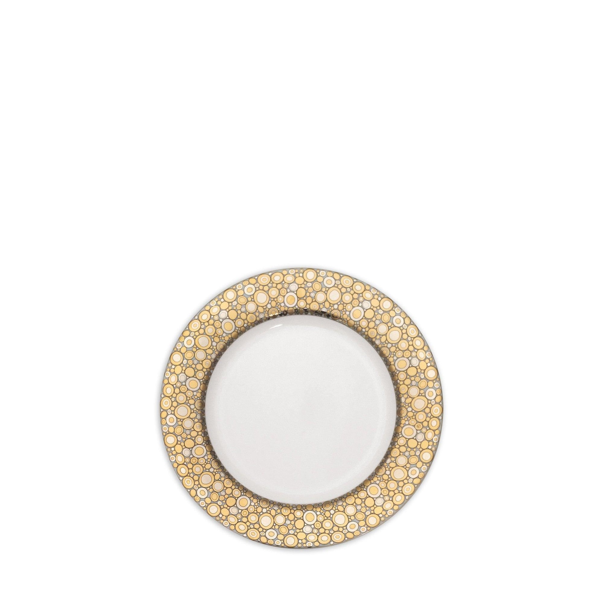 The Ellington Shimmer Gold & Platinum Bread & Butter Plate by Caskata Artisanal Home is a white ceramic plate adorned with a gold and beige bubble pattern on the rim. This hand-decorated bread plate brings an elegant harmony to any table setting and is dishwasher safe for easy cleaning.